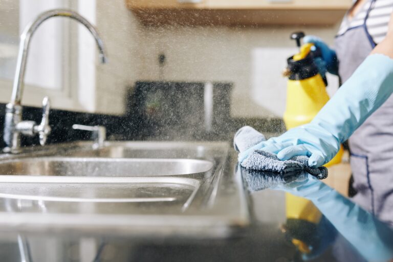 Disinfecting a kitchen counter after being sick
